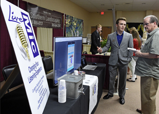 LOOKING TO THE FUTURE Looking to the future: CEO Program students show off hard work at trade show